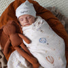 Soft Up & Away organic muslin wrap featuring a charming hot air balloon print, made from breathable organic cotton for swaddling, pram outings, feeding and everyday baby comfort.