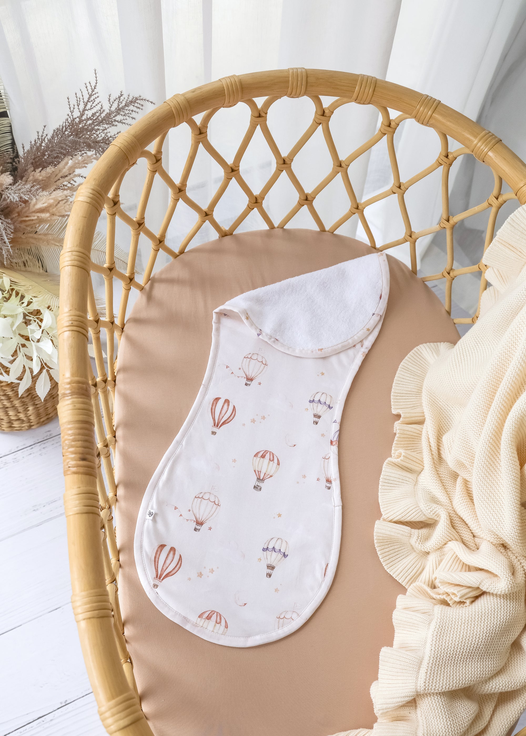 Soft Up & Away organic cotton burp cloth featuring a hot air balloon print, made from absorbent organic cotton to protect clothing during feeding and keep babies comfortable.