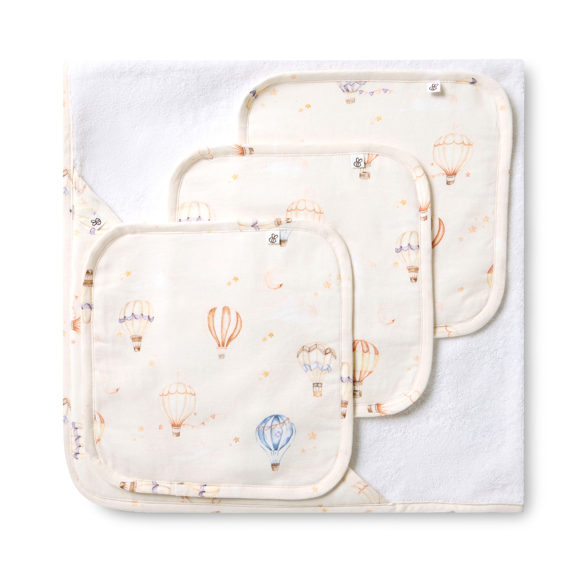 Soft Up & Away organic hooded baby towel made from absorbent organic cotton with a sweet hot air balloon print, perfect for newborn bath time and keeping babies warm after bathing.