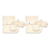 Soft cream organic cotton knit baby booties designed to keep newborn feet warm and comfortable, featuring a timeless neutral colour perfect for everyday wear or gifting.