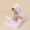 Soft Up & Away organic hooded baby towel made from absorbent organic cotton with a sweet hot air balloon print, perfect for newborn bath time and keeping babies warm after bathing.