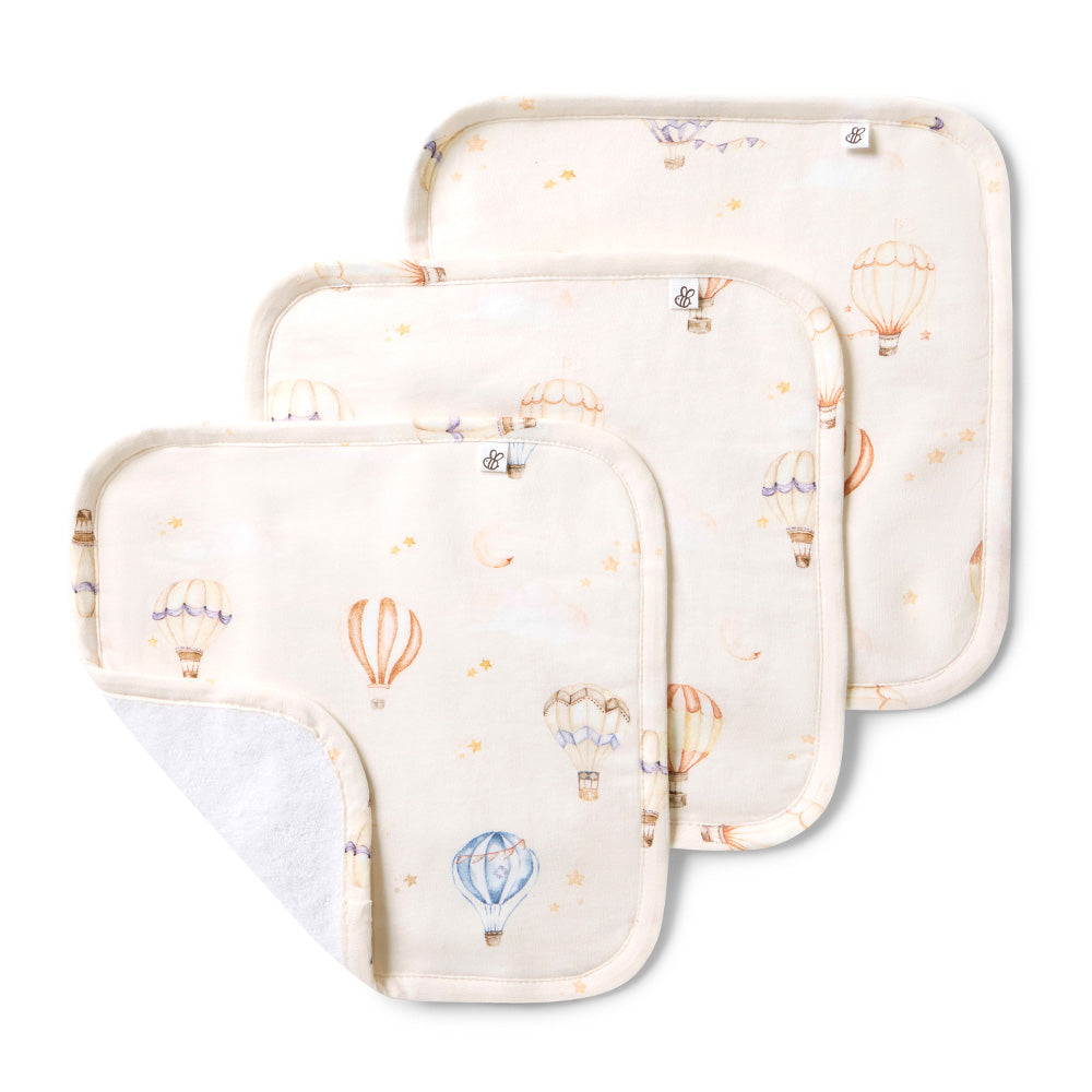 Soft organic cotton Up & Away wash cloths 3 pack featuring a charming hot air balloon print, perfect for baby bath time, feeding and everyday use. Gentle, breathable and absorbent for delicate newborn skin.